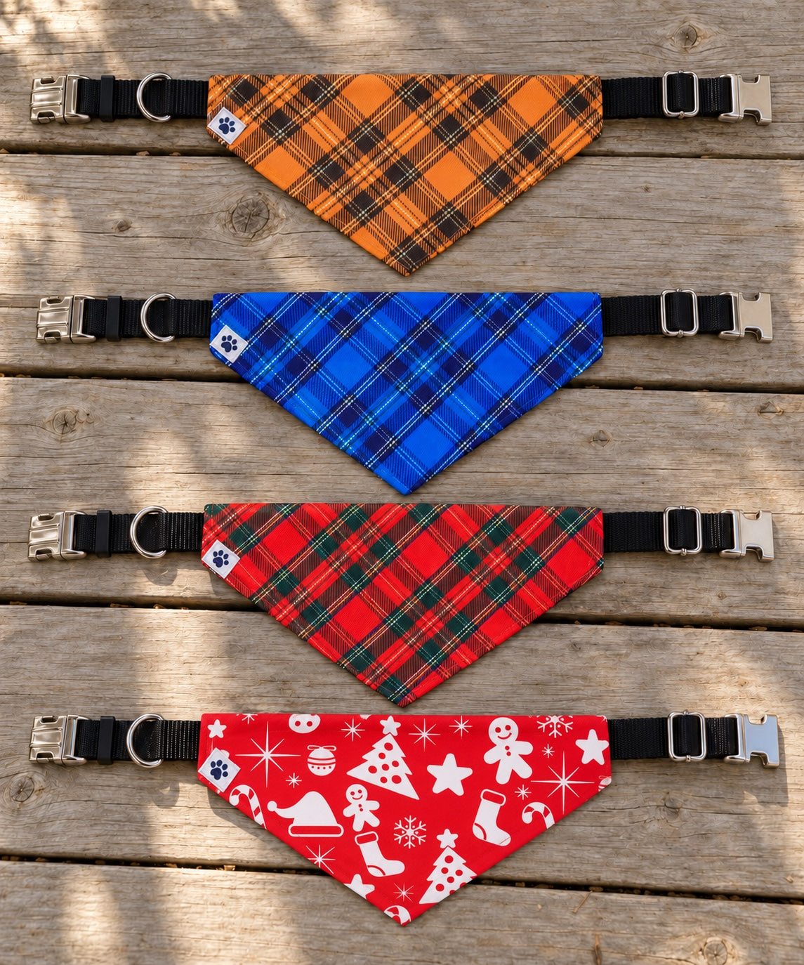 The four Front Porch bandana collars laid out on porch boards